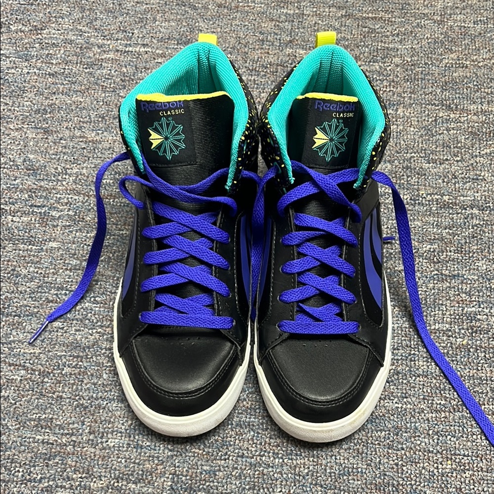 Kids size 5 / Women’s size 6.5 Reebok Black and Purple High-Tops